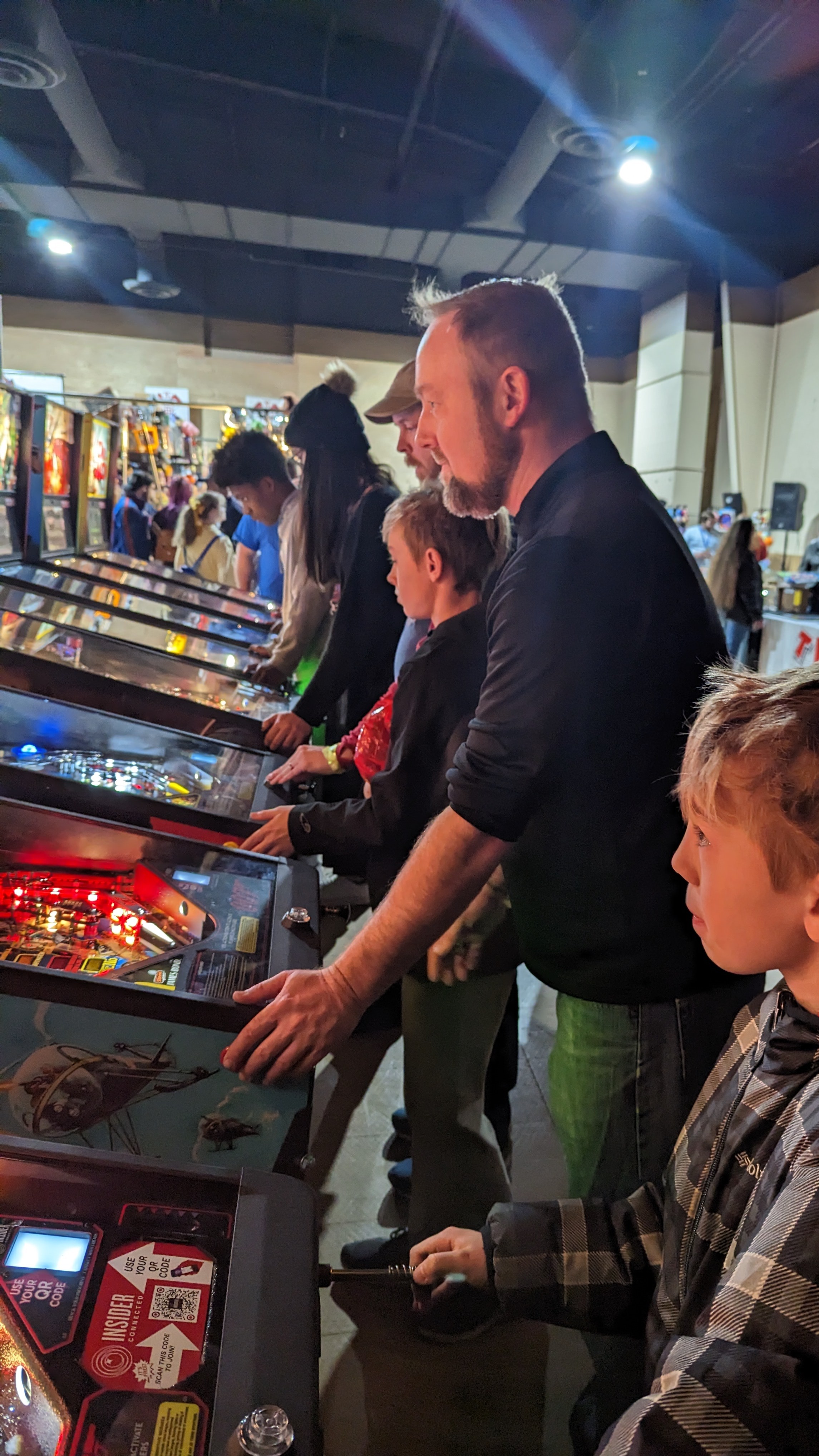 Eric Jarvis playing pinball. Photo provided by Eric Jarvis.