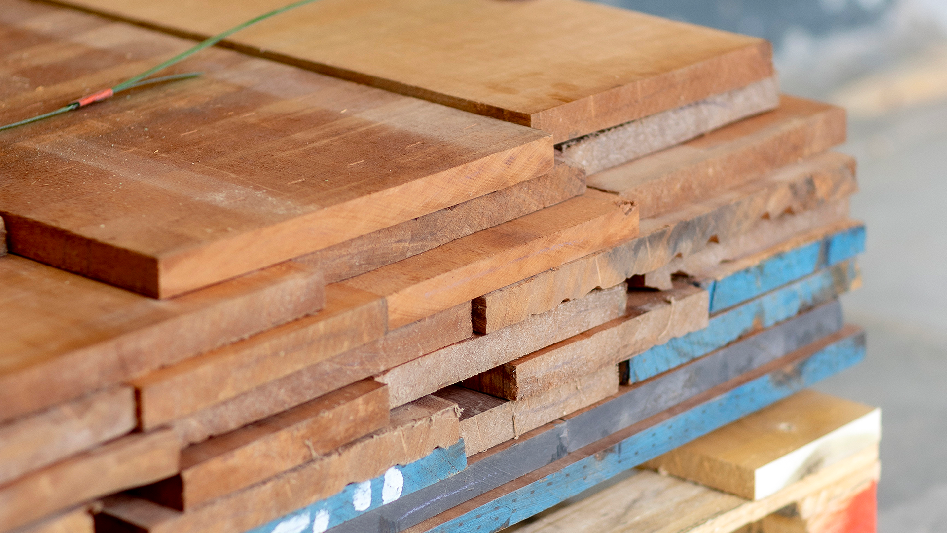 Stacked mahogany boards